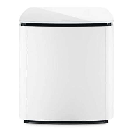 Le caisson de basses bose blanc Bass Module 700 posé sur un sol clair avec son plateau en verre