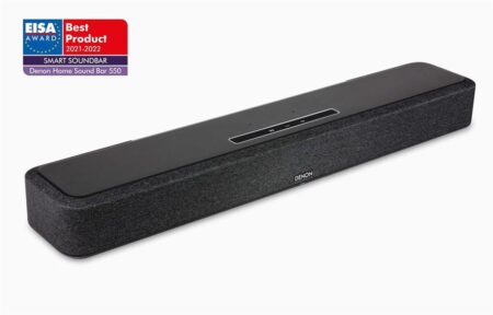 Barre de son sans fil bluetooth denon home 550 noir posée devant un téléviseur avec design compact et élégant