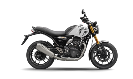 Moto triumph speed 400 noire avec design roadster néo rétro et éclairage LED moderne.